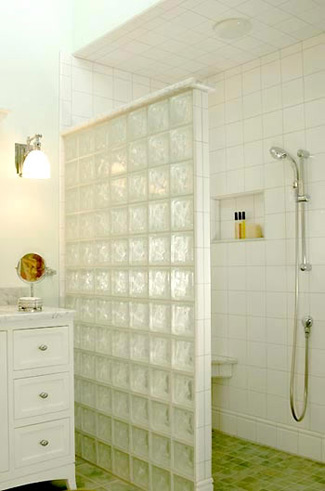 Walk-in shower with glass tile wall